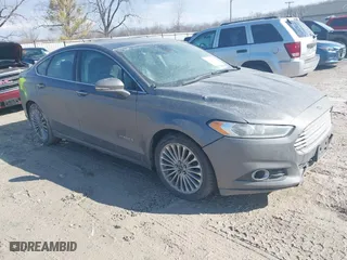 2014 Ford Fusion Titanium Hybrid with VIN 3FA6P0RU6ER210210, listed as a IAAI auction lot 41613028 with 203,410 mi miles. Bid and sale history available at carsss.com. Image 1.