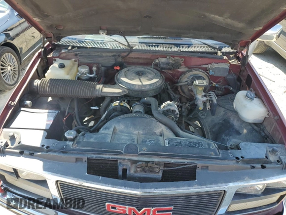 1989 GMC Sierra 1500 with VIN 1GTDC14H6KE537928, listed as a Copart auction lot 58233914 with 90,754 mi miles and Salvage Title. Bid and sale history available at DreamBid. Image 11.
