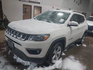 2020 Jeep Compass Latitude with VIN 3C4NJDBB3LT138454, listed as a IAAI auction lot 41614631 with 82,079 mi miles and . Bid and sale history available at DreamBid. Image 2.