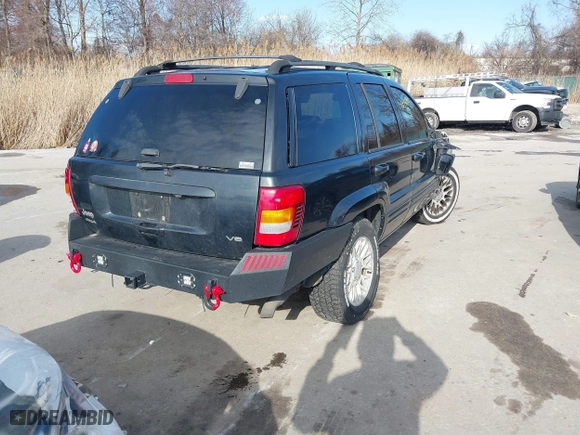 2004 Jeep Grand Cherokee Limited with VIN 1J4GW58N74C120435, listed as a IAAI auction lot 41815094 with 193,056 mi miles. Bid and sale history available at carsss.com. Image 4.