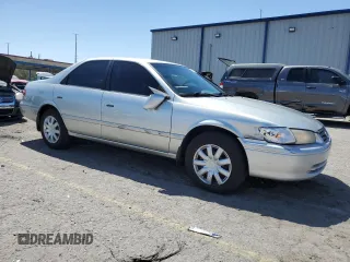 2000 Toyota Camry CE with VIN JT2BG22KXY0492183, listed as a Copart auction lot 52596705 with 181,840 mi miles and Salvage Title. Bid and sale history available at carsss.com. Image 4.