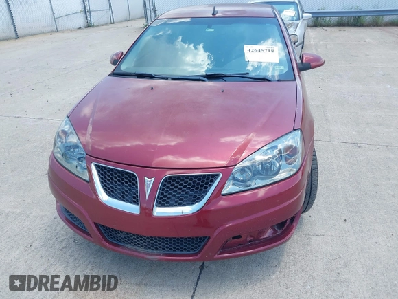 2009 Pontiac G6 1SB with VIN 1G2ZJ57B694245677, listed as a IAAI auction lot 42645718 with 188,261 mi miles and . Bid and sale history available at DreamBid. Image 6.