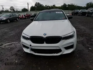2019 BMW M5 Competition z VIN WBSJF0C54KB447781, wystawiony jako Copart lot #63513033 z przebiegiem 27 417 mil mil oraz Szkoda całkowita • Salvage title. Historia ofert i sprzedaży dostępna na DreamBid. Obrazek 10.