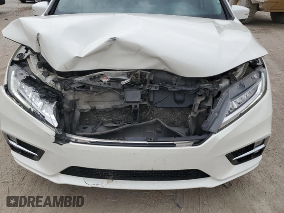 2019 Honda Odyssey Elite z VIN 5FNRL6H93KB069516, wystawiony jako Copart lot #53795885 z przebiegiem 96 808 mil mil oraz Szkoda całkowita • Salvage title. Historia ofert i sprzedaży dostępna na DreamBid. Obrazek 12.