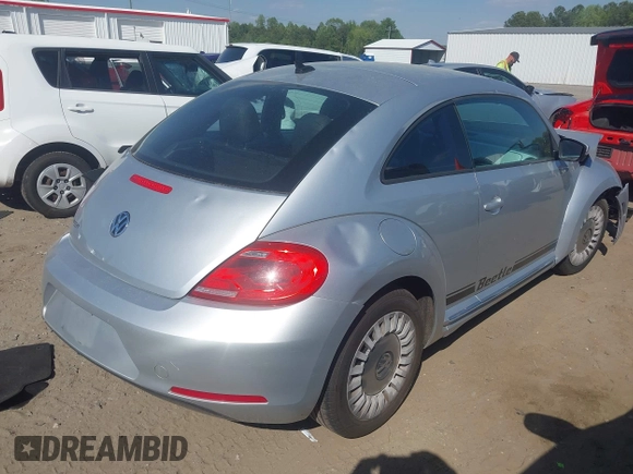 2014 Volkswagen Beetle 2.5L w/Sun with VIN 3VWJP7AT7EM633386, listed as a IAAI auction lot 42060290 with 273,374 mi miles and . Bid and sale history available at DreamBid. Image 4.