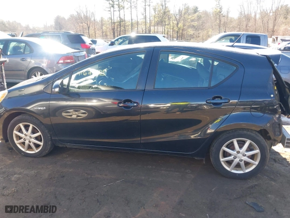 2013 Toyota Prius c One with VIN JTDKDTB36D1034076, listed as a IAAI auction lot 41622385 with 148,920 mi miles. Bid and sale history available at carsss.com. Image 14.