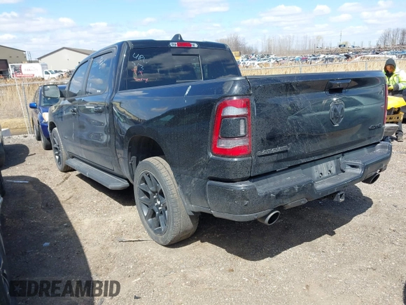 2023 Ram 1500 Laramie with VIN 1C6SRFJT6PN542105, listed as a IAAI auction lot 41974428 with 74,489 mi miles and . Bid and sale history available at DreamBid. Image 3.