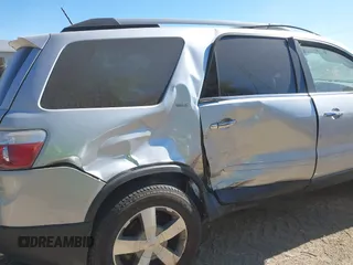 2010 GMC Acadia SLT1 z VIN 1GKLRMEDXAJ202687, wystawiony jako IAAI lot #40635219 z przebiegiem 115 810 mil mil oraz . Historia ofert i sprzedaży dostępna na DreamBid. Obrazek 6.