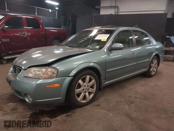 2002 Nissan Maxima GLE z VIN JN1DA31A12T308581, wystawiony jako IAAI lot #41742949 z przebiegiem 116 892 mil mil oraz . Historia ofert i sprzedaży dostępna na DreamBid. Obrazek 17.