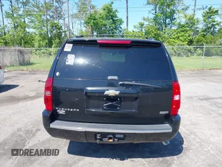 2011 Chevrolet Suburban LTZ with VIN 1GNSCKE01BR275919, listed as a IAAI auction lot 42038399 with 247,841 mi miles. Bid and sale history available at carsss.com. Image 16.