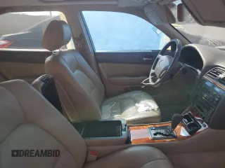 1998 Lexus LS 400 z VIN JT8BH28F9W0116715, wystawiony jako Copart lot #46878775 z przebiegiem 97 170 mil mil oraz Szkoda całkowita • Salvage title. Historia ofert i sprzedaży dostępna na DreamBid. Obrazek 7.