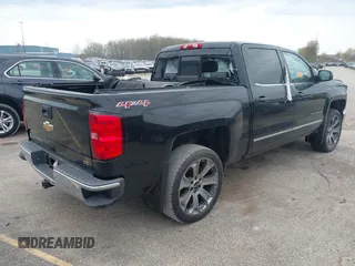 2015 Chevrolet Silverado 1500 LTZ with VIN 3GCUKSEC4FG204783, listed as a IAAI auction lot 42210982 with 130,447 mi miles and . Bid and sale history available at DreamBid. Image 4.