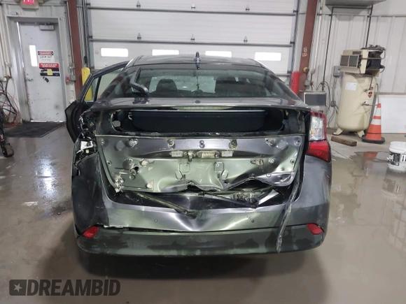 2021 Toyota Prius L Eco z VIN JTDKAMFU9M3132587, wystawiony jako IAAI lot #41637275 z przebiegiem 84 203 mil mil oraz . Historia ofert i sprzedaży dostępna na DreamBid. Obrazek 16.