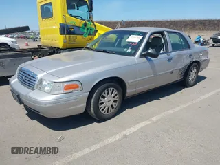 2005 Ford Crown Victoria LX с VIN 2FAFP74W75X166169, выставлен на аукционе IAAI как лот 42406708 с пробегом 85 372 миль миль и . История ставок и продаж доступна на DreamBid. Изображение 2.