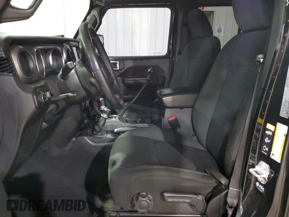 2021 Jeep Gladiator Willys with VIN 1C6HJTAG4ML556255, listed as a Copart auction lot 57143125 with 57,104 mi miles and Salvage title. Bid and sale history available at DreamBid. Image 7.