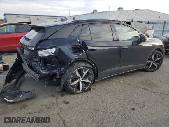 2023 Volkswagen ID.4 Pro with VIN 1V2VMPE80PC028390, listed as a Copart auction lot 48566185 with 74,329 mi miles and Salvage Title. Bid and sale history available at DreamBid. Image 3.