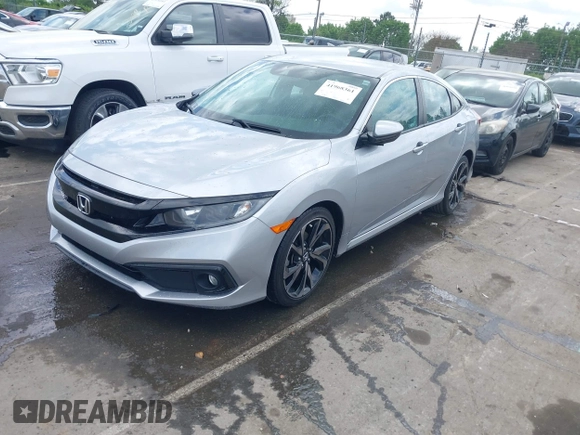 2021 Honda Civic Sport with VIN 2HGFC2F88MH530214, listed as a IAAI auction lot 41968361 with 60,869 mi miles and . Bid and sale history available at DreamBid. Image 17.
