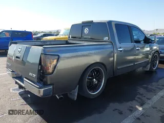 2004 Nissan Titan LE with VIN 1N6AA07A14N541998, listed as a IAAI auction lot 42304039 with 189,533 mi miles and . Bid and sale history available at DreamBid. Image 4.
