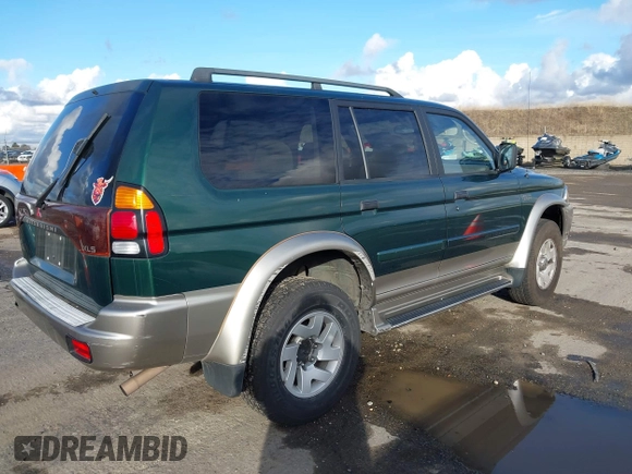 2001 Mitsubishi Montero Sport XLS with VIN JA4LS31HX1P005173, listed as a IAAI auction lot 40979545 with 147,168 mi miles. Bid and sale history available at carsss.com. Image 4.