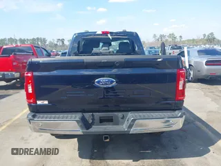 2021 Ford F-150 XL z VIN 1FTMF1E5XMKE72999, wystawiony jako IAAI lot #41790862 z przebiegiem 55 991 mil mil oraz . Historia ofert i sprzedaży dostępna na DreamBid. Obrazek 16.