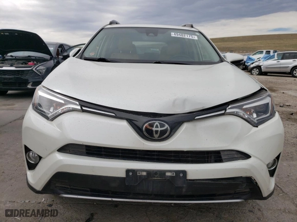 2018 Toyota RAV4 Limited with VIN JTMDFREV1JJ738071, listed as a Copart auction lot 49482175 with 57,506 mi miles and Salvage Title. Bid and sale history available at carsss.com. Image 5.