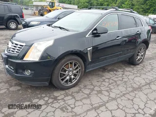 2013 Cadillac SRX Performance Collection z VIN 3GYFNHE39DS642111, wystawiony jako IAAI lot #42470291 z przebiegiem 176 239 mil mil oraz . Historia ofert i sprzedaży dostępna na DreamBid. Obrazek 17.