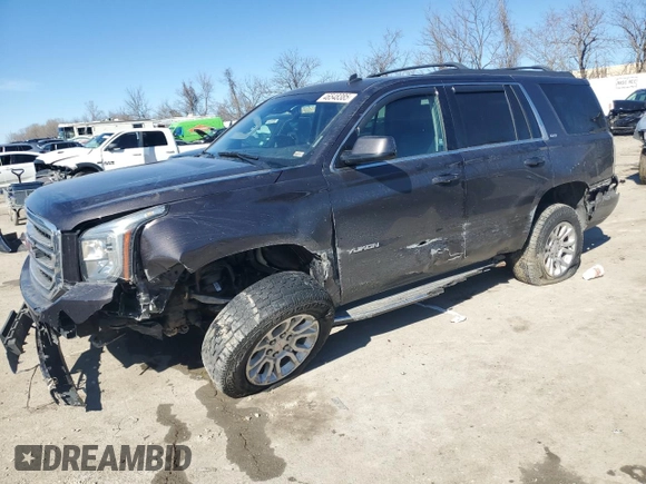 2015 GMC Yukon SLT with VIN 1GKS2BKC8FR232912, listed as a Copart auction lot 46548385 with 221,353 mi miles and Salvage Title. Bid and sale history available at carsss.com. Image 1.