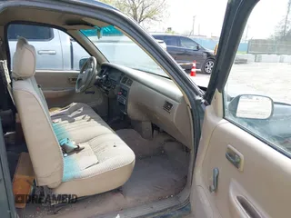 1993 Toyota T100 DX with VIN JT4VD10AXP0012790, listed as a IAAI auction lot 42179976 with 215,526 mi miles. Bid and sale history available at carsss.com. Image 5.