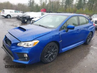 2021 Subaru WRX Premium z VIN JF1VA1C6XM9818786, wystawiony jako IAAI lot #42182203 z przebiegiem 52 535 mil mil oraz . Historia ofert i sprzedaży dostępna na DreamBid. Obrazek 2.