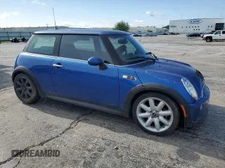 2005 MINI Hardtop S with VIN WMWRE33465TG95065, listed as a Copart auction lot 55536195 with 104,064 mi miles and Clean Title. Bid and sale history available at DreamBid. Image 4.