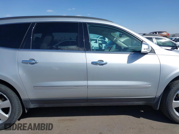 2014 Chevrolet Traverse LTZ with VIN 1GNKRJKD2EJ185682, listed as a IAAI auction lot 41728837 with 79,516 mi miles and . Bid and sale history available at DreamBid. Image 13.