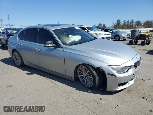 2014 BMW 3 Series 335i xDrive with VIN WBA3B9G57ENR91797, listed as a Copart auction lot 53724325 with 164,279 mi miles and Salvage Title. Bid and sale history available at DreamBid. Image 4.