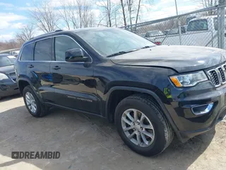 2021 Jeep Grand Cherokee Laredo X with VIN 1C4RJFAG7MC502866, listed as a IAAI auction lot 41841328 with 59,870 mi miles and . Bid and sale history available at DreamBid. Image 13.