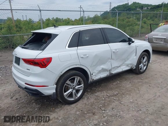 2022 Audi Q3 S line Premium Plus with VIN WA1EECF38N1031860, listed as a IAAI auction lot 42345075 with 27,171 mi miles and . Bid and sale history available at DreamBid. Image 4.