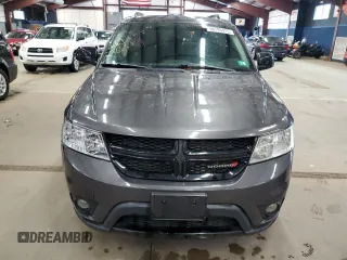 2019 Dodge Journey SE z VIN 3C4PDCBG4KT873206, wystawiony jako Copart lot #58193915 z przebiegiem 72 532 mil mil oraz Tytuł czysty. Historia ofert i sprzedaży dostępna na DreamBid. Obrazek 5.