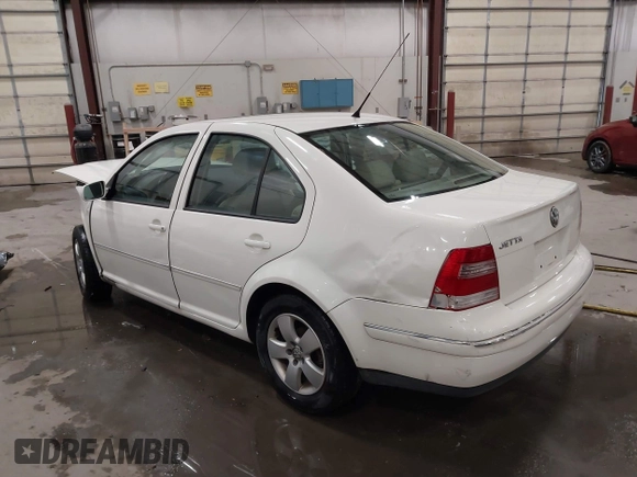 2004 Volkswagen Jetta GLS z VIN 3VWSK69MX4M078023, wystawiony jako IAAI lot #41198138 z przebiegiem 153 830 mil mil oraz . Historia ofert i sprzedaży dostępna na DreamBid. Obrazek 3.