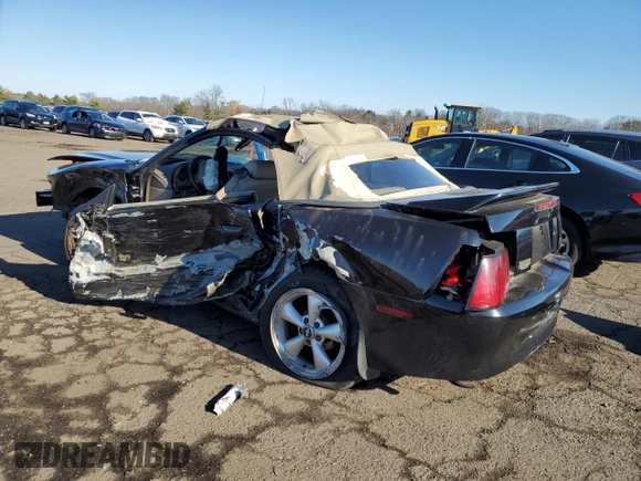 1999 Ford Mustang with VIN 1FAFP4443XF137375, listed as a Copart auction lot 82615074 with Not provided miles and Salvage title. Bid and sale history available at DreamBid. Image 2.