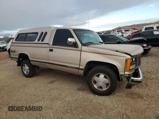 1989 GMC Sierra 1500 with VIN 2GTEK14K0K1565339, listed as a Copart auction lot 83792294 with Not Provided miles and Salvage Title. Bid and sale history available at DreamBid. Image 4.
