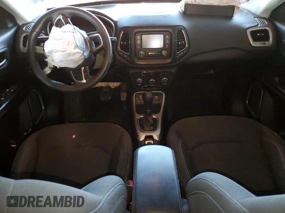 2018 Jeep Compass Sport with VIN 3C4NJCAB7JT369169, listed as a Copart auction lot 62609335 with 148,398 mi miles and Salvage title. Bid and sale history available at DreamBid. Image 8.
