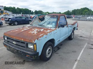 1991 Chevrolet Colorado 1LT z VIN 1GCCS14E7M8105645, wystawiony jako IAAI lot #42379685 z przebiegiem 106 778 mil mil oraz . Historia ofert i sprzedaży dostępna na DreamBid. Obrazek 2.