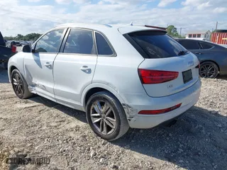 2018 Audi Q3 Premium with VIN WA1BCCFS6JR010047, listed as a IAAI auction lot 41795209 with 99,609 mi miles. Bid and sale history available at carsss.com. Image 3.