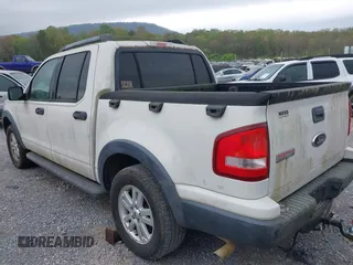 2010 Ford Explorer Sport Trac XLT z VIN 1FMEU3BE3AUA02528, wystawiony jako IAAI lot #41940283 z przebiegiem 96 049 mil mil oraz . Historia ofert i sprzedaży dostępna na DreamBid. Obrazek 3.