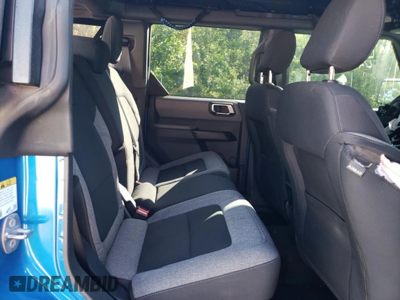2021 Ford Bronco z VIN 1FMDE5BH2MLA73700, wystawiony jako Copart lot #63024595 z przebiegiem 63 174 mil mil oraz Szkoda całkowita • Salvage title. Historia ofert i sprzedaży dostępna na DreamBid. Obrazek 11.