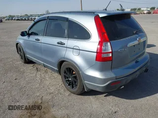 2009 Honda CR-V EX with VIN JHLRE38599C004833, listed as a IAAI auction lot 41982725 with 212,280 mi miles and . Bid and sale history available at carsss.com. Image 3.