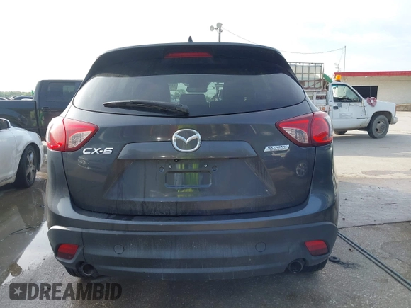 2014 Mazda CX-5 Grand Touring with VIN JM3KE2DY7E0345742, listed as a IAAI auction lot 41864116 with 158,746 mi miles. Bid and sale history available at carsss.com. Image 16.