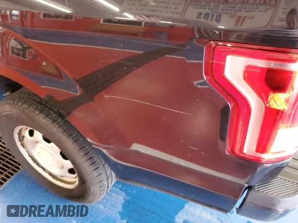 2015 Ford F-150 XL with VIN 1FTEX1C87FKD12113, listed as a IAAI auction lot 42786507 with 260,763 mi miles and . Bid and sale history available at DreamBid. Image 6.