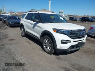 2022 Ford Explorer XLT z VIN 1FMSK8DHXNGC10004, wystawiony jako IAAI lot #42051660 z przebiegiem 184 416 mil mil oraz . Historia ofert i sprzedaży dostępna na DreamBid. Obrazek 1.