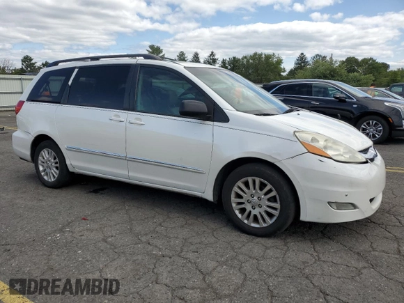2010 Toyota Sienna XLE с VIN 5TDDK4CC5AS029985, выставлен на аукционе Copart как лот 84182164 с пробегом 232 460 миль миль и Списание • Salvage title. История ставок и продаж доступна на DreamBid. Изображение 4.