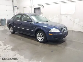 2003 Volkswagen Passat GLS with VIN WVWPD63B13P288237, listed as a IAAI auction lot 41557159 with 180,140 mi miles. Bid and sale history available at carsss.com. Image 1.