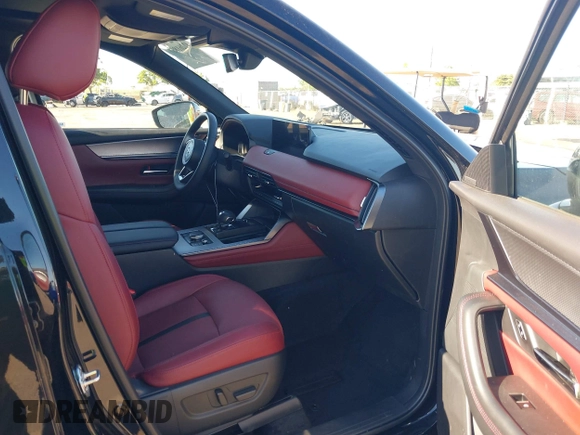 2025 Mazda CX-70 Premium Plus with VIN JM3KJEHA8S1100304, listed as a IAAI auction lot 42261867 with 2,678 mi miles and . Bid and sale history available at DreamBid. Image 5.